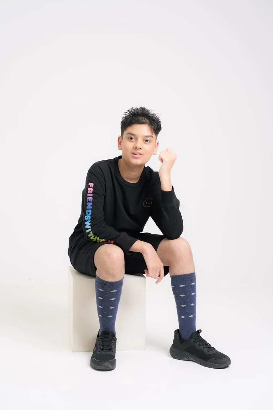 Aarav Trivedi, young author, in a studio portrait