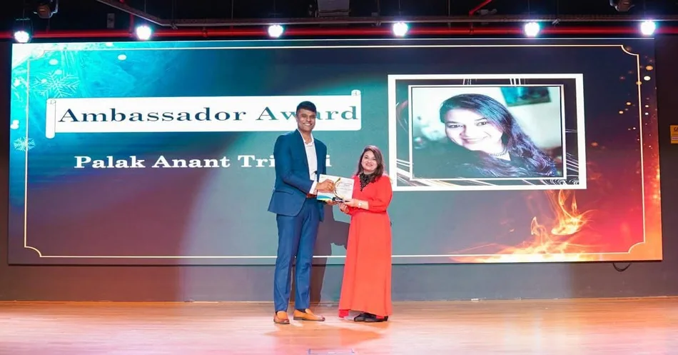Accepting the Ambassador Award on stage